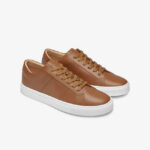 Brown sneakers with stripes