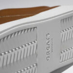 Brown sneakers with stripes